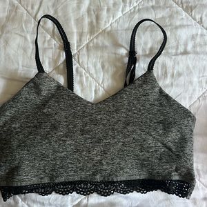 Black and white beyond yoga sports bra with lace detail size small
